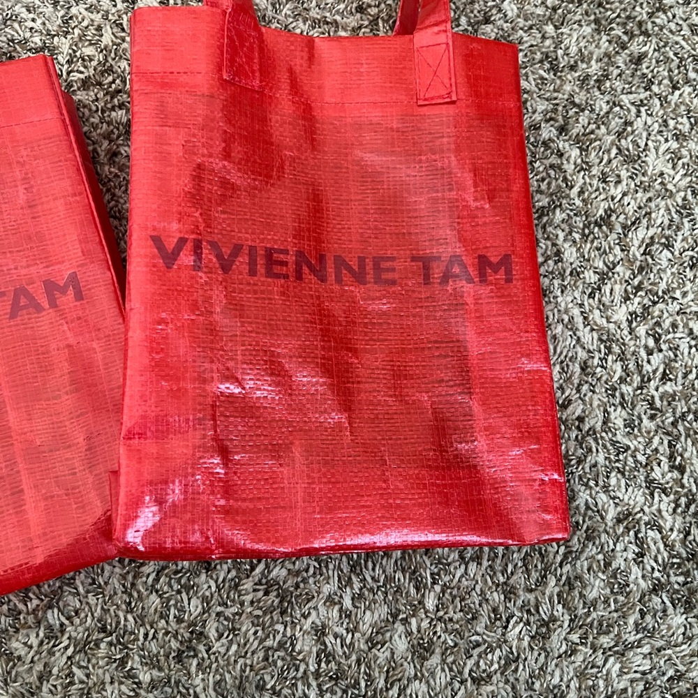 2 Vivienne Tam tote bags